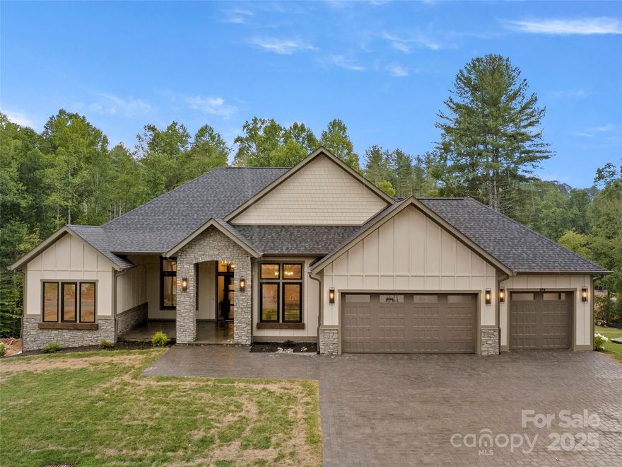 Welcome to Horseshoe's newest gated community! Nestled among rolling hills, lush trees, and a tranquil stream, this brand new construction home offers an escape from the bustle of everyday life. It boasts an open floor plan designed for effortless one-level living, with high ceilings and a soaring fireplace. Chilling on the screened-in deck with built-in grilling station makes it the perfect spot for entertaining. Also featured is a chef's kitchen with exquisite Crystal Quartz countertops, a large walk-in pantry, and stainless steel "energy star" Thermador appliances. Indulge in the luxurious spa-like primary bath with a large, walk-in, dual-head shower. In addition, the partially finished basement offers lots of natural light, high ceilings, heated floors, an additional living area with guest kitchen, rec area, storage and the potential for additional bedrooms/baths. Enjoy easy access to Brevard, Hendersonville, Arden, and South Asheville. Call me today to schedule your private tour.