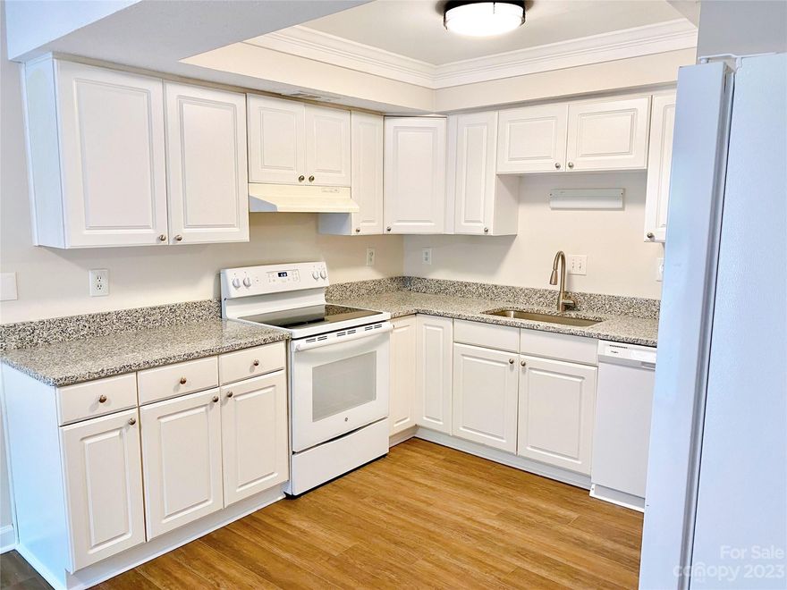 Fabulous and Convenient Location! Updated Two Story Townhome: Features include: Transitional Floor Plan, Great Room with Fireplace, Dining Room, Kitchen with New Granite Counters, Recent Luxury Vinyl Plank Flooring and Carpeting throughout. Updated Baths with New Vanities, Water Closets and Tile Flooring on upper floor, New Interior Paint, New Gas Water Heater, Gas Furnace and Central Air replaced in 7/17.   New Architectural Roof Installed 4/2023- NOTE: Active Roof/Commercial Gutters and Downspouts Assessment in Place for a total of $6,000 through 10/23.  Owners have pre-paid the assessment in full.  Great Patio off Dining Room and Private Deck off Primary Suite.  Raintree offers 36 holes of golf a fabulous renovated Club and pool and tennis if you decide to join the club and have a membership (OPTIONAL).  The Membership Fee to Raintree Club is wavied with the purchase of this unit.  To get further information about Raintree Club, go to:  https://raintreecountryclub.com/membership.