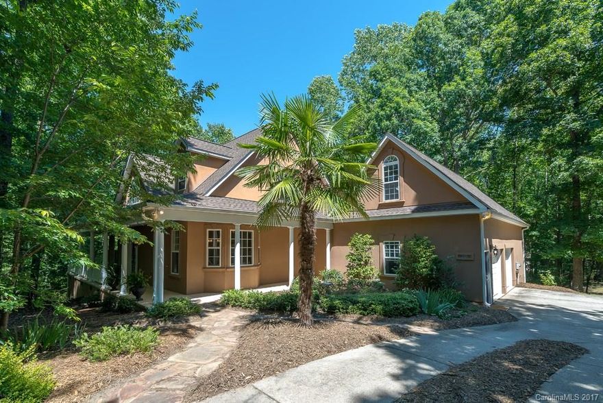 This home is situated at the end of a cul-de-sac on 1.5 acres lot with a long & lovely private driveway leading to a charming cottage hideaway with wooded views. With an expansive wrap around front porch & impressive screened back porch overlooking nature, it will not disappoint. The kitchen flows w/granite countertops & an island open to the family room w/ a 2 story stone fireplace. A tranquil master on the main & updated bath featuring a new  frameless shower door. New roof w/Gutter Guard.