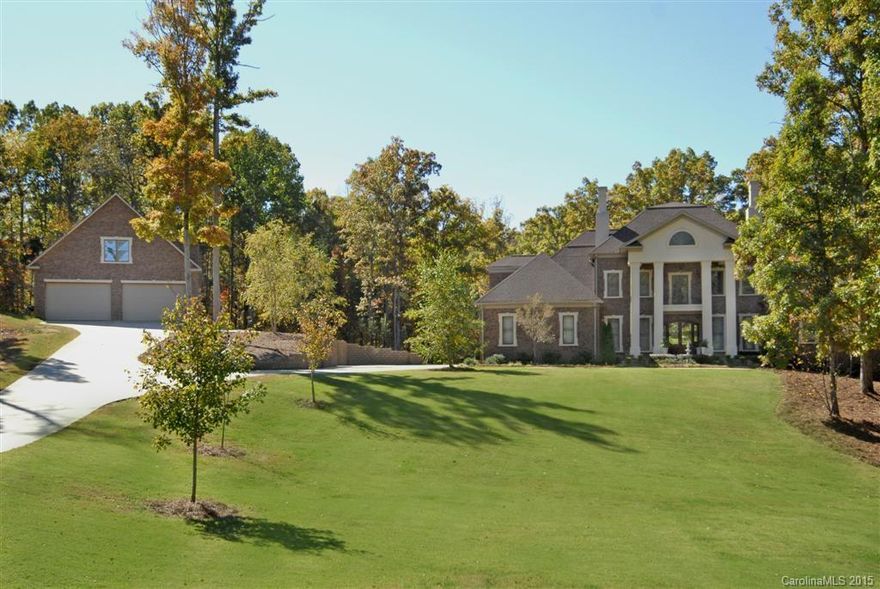 Extras galore! Hookups for 2 washer and dryers, 4 heat pumps, 4 thermostats, lovely Chef kitchen with vegetable sink and granite galore.  Superb cabinetry, under counter lighting, hardwood floors, 9 ft. doors, wine cooler, incandescent lighting, gorgeous backsplash.  See thru to the Sunroom, fantastic covered porch.  Tremendous Master Bedroom and Master Bath, separate his and her vanity, large shower and closet space galore.  3 car garage w/8 car detached.