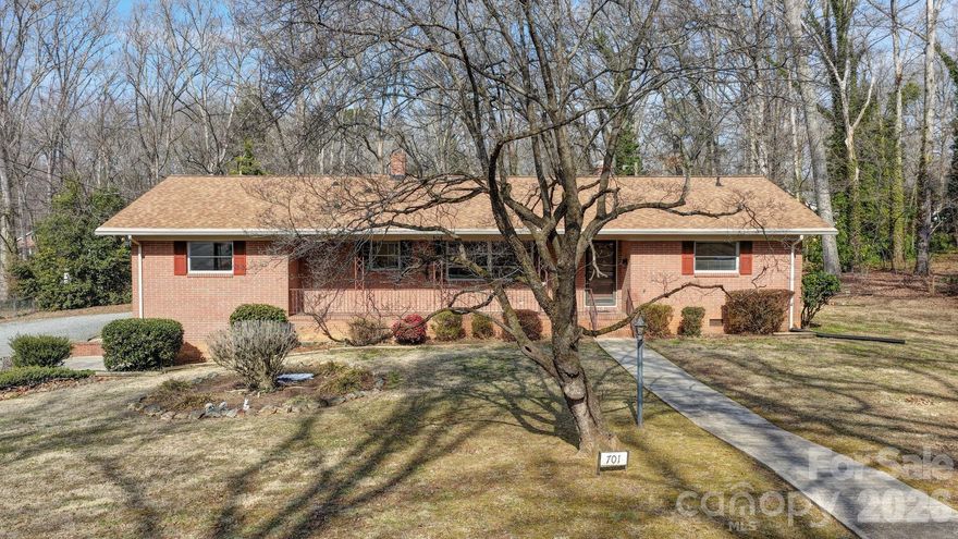 Owner Offering up to $10,000 SELLER CREDIT and a one-year Home Warranty on this charming all-brick 1964 home in one of Albemarle's most highly sought-after Forest Hills neighborhood, this well-maintained home marries timeless character with practical flexibility. The original finishes have been lovingly preserved. There is plenty of built-in storage and large, bright windows. The spacious principal rooms are arranged for comfortable everyday living and effortless entertaining. A unique partial basement, formerly outfitted as a dental lab, offers plumbing and utility infrastructure and could be transformed into a private apartment, in-law or multi-generational suite, small shop, or a commercial office with separate entry from the outside—an exceptional opportunity for income generation or live/work convenience. The property also offers ample parking and a private yard, and is conveniently located near the hospital, schools (Pfeiffer University & Stanly Community College, library, governmental offices, shopping, and restaurants. Conveniently located 45-60 minutes to Charlotte, Concord, and Pinehurst. Experience the quality of solid construction and imagine the possibilities—schedule a tour today.