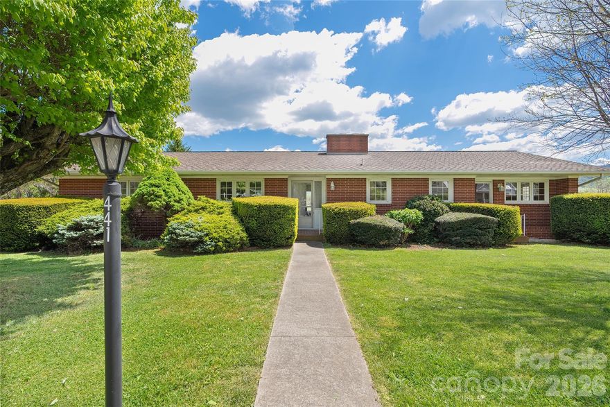 This beautifully updated ranch-style home in the desirable Mulberry Street neighborhood in Clyde offers the perfect blend of comfort, style, and convenience. Situated on 0.39 acres, the property provides easy access to I-40 and Highway 19/23, making shopping, dining, and everyday essentials just minutes away! The main level features  thoughtfully updated, move-in-ready living space. Inside, you’ll find 3BD/2BA, along with a formal living room featuring a gorgeous fireplace, a dining area, and a spacious family room! The kitchen offers great functionality and flow, ideal for both daily living and entertaining. Step out from the family room onto the expansive TimberTech deck, where you can relax and take in beautiful views of the surrounding pastures and mountains.  The lower level adds additional square feet and offers a versatile walkout, daylight basement complete with a flex/bonus room, laundry area and a rec room featuring a fireplace that opens to a charming patio, creating even more outdoor living space to enjoy the peaceful setting. An oversized garage with ample space for a workshop or additional storage completes the lower level!  Meticulously maintained and thoughtfully updated throughout, this home offers modern appeal, flexible living spaces, scenic views, and an unbeatable location. Don’t miss this exceptional opportunity!