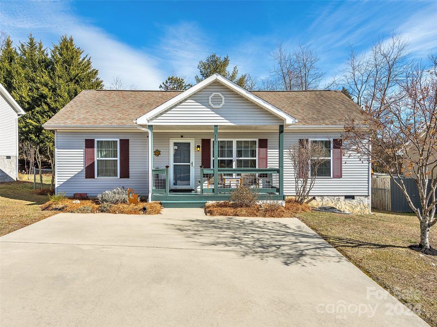 Very cute and beautifully maintained one level home in convenient Fletcher location features mountain views off the back porch, desirable split bedroom floor plan with 3 bedrooms and 2 full baths, open living room, beautiful wood laminate floors and a covered front porch. Be sure to check out the video virtual tour. Affordably priced and this one won't last long so come and see it today!