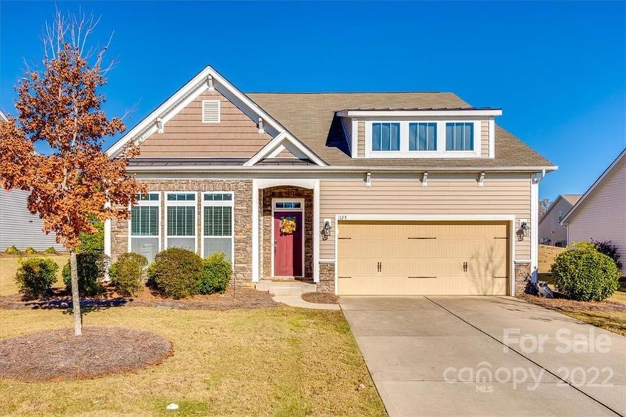 Charming ranch home with open floor plan with hardwoods throughout main living areas. Large kitchen island, granite countertops and stainless steel appliances.  Great room with built in shelving and gas fireplace. The spacious master features a coffered ceiling, deluxe bath with granite dual vanity sinks, separate tub and shower, walk-in closet.  Enjoy outdoor living  -screened porch and patio with a  fenced in backyard.  A short walk to neighborhood amenities. Welcome home to resort style living!