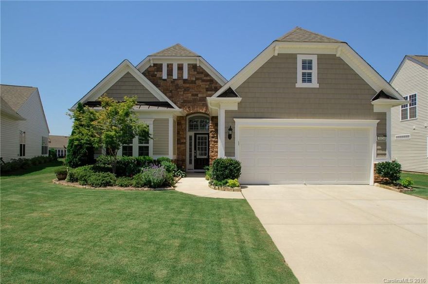 Beautiful Home w Low Voltage Lighting in Front, Stone Edging, Extended Brick Paver Patio with Extended Flower Beds. 3 Seasons Room w Sun Shades. Energy Efficient Radiant Sheathing Roof. G Kitchen w Hardwood, SS Appliances, Island, Granite, Under Cabinet Lighting, and  Computer Niche. Ceiling Fans, Crown Molding, and Plantation Shutters Throughout. Owner’s Suite w Tray Ceiling, Custom Walk-In Closet, Dual-Sinks,  Tub, and Walk-In Shower. Two Car Garage w Extension, Epoxy Floor, & Above Shelving.