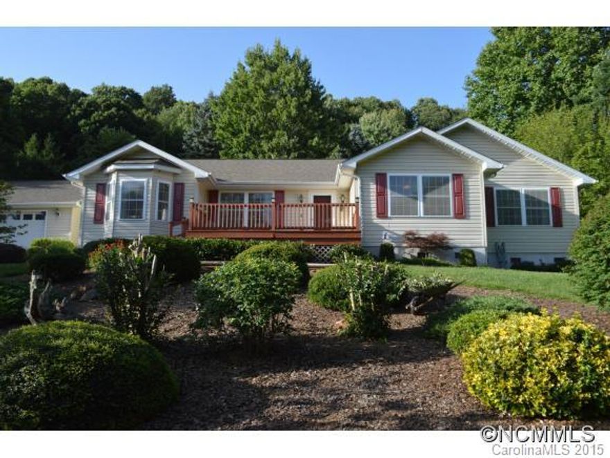 One level living in peaceful setting - open floor plan with split bedrooms for guest privacy.. garage on main.. feels spacious - not chopped up.. Mountain views in the distance.. easy drive from downtown.. MBR has 4 closets-1 is walk in.. laundry room for crafts& storage.. workshop in 2 car garage.. 2 fireplaces(Dining & Living)..  Neutral colors.. updated floors & baths. Electro-static filter on HVAC. Clean & Convenient. Bring a tooth brush