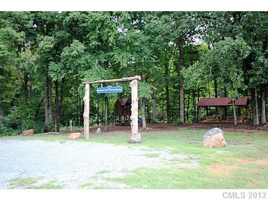 SERENITY AND CALMNESS WILL SURROUND YOU WHEN ENTERING THIS AWESOME COMMUNITY. CLEARED READY TO BUILD 1.016 ACRE LOT. YOUR CUSTOM DREAM CAN BE YOUR REALITY! COMMUNITY OFFERS WALKING TRAILS, COMMUNITY PARK WITH PLAY GROUND AND FISHING POND. FOR A SEPARATE FEE, PRIVATE CLUB HOUSE AND BARN ARE AVAILABLE FOR USE.