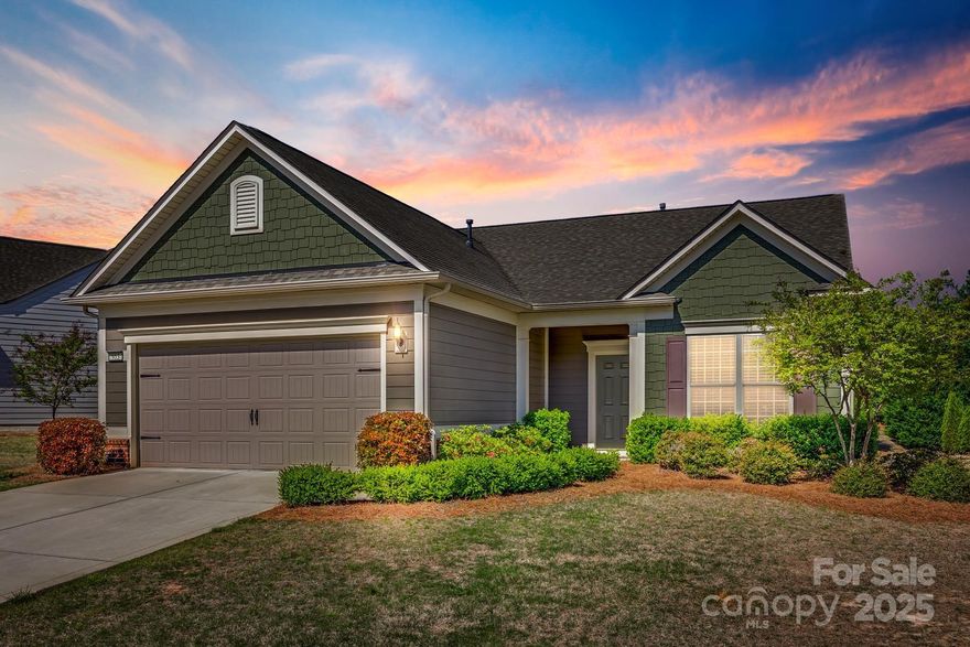 Welcome to this beautiful Martin Ray model in the amenity-rich neighborhood of Carolina Orchards (55+). Entertain with ease in this open floor plan. Kitchen has stainless steel appliances, granite countertops, cabinets with soft close drawers/doors, oversized island, butler's pantry & walk-in pantry. The Kitchen opens to a spacious Dining Area and oversized Living Room. Primary Suite overlooks a large common-area and features a large closet, linen closet and spa-like bathroom with a huge walk-in shower, double sinks and granite countertops. So much space in this home: 2nd and 3rd Bedroom, Full Bath with tub and granite countertops, Office, spacious Laundry Room, Drop Zone, and many closets! Enjoy the outdoors on your screened-in patio and private back yard.