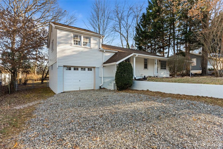 Welcome to a charming 3 Bed/2 Bath Bungalow in West Asheville, one of the city's fastest-growing neighborhoods with vibrant street art and diverse dining. This home features a large, fenced level backyard with views of Downtown Asheville. A spacious kitchen, and a deck for outdoor entertainment. The primary bedroom, just six steps up, includes a walk-in closet, while the beautifully remodeled bathroom and updated second bath with laundry area add modern flair. With almost new carpeting, new flooring, a garage, and an unfinished basement, this home seamlessly combines character and convenience. Minutes from downtown, shopping, restaurants, and healthcare, it's a perfect opportunity to embrace West Asheville living. Don't miss out on this delightful bungalow!
