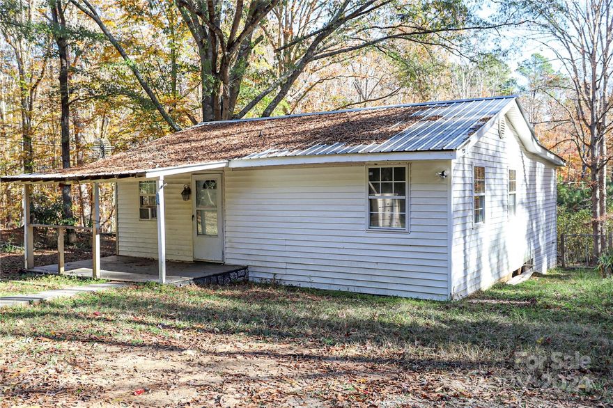 One bedroom, two bath cottage nestled in the woods for peace and tranquility. This home could potentially be a three bedroom if closets were added to the two additional rooms. The home sits on 1.18 acres in the Andrew Jackson school district. Whether you are looking for a personal home, a rental, a fix and flip, or an Airbnb, this home has great potential. A home in this price range is a rare find. With your vision, this home can be made into a charming cottage in the woods. Come take a tour and visualize the possibilities.