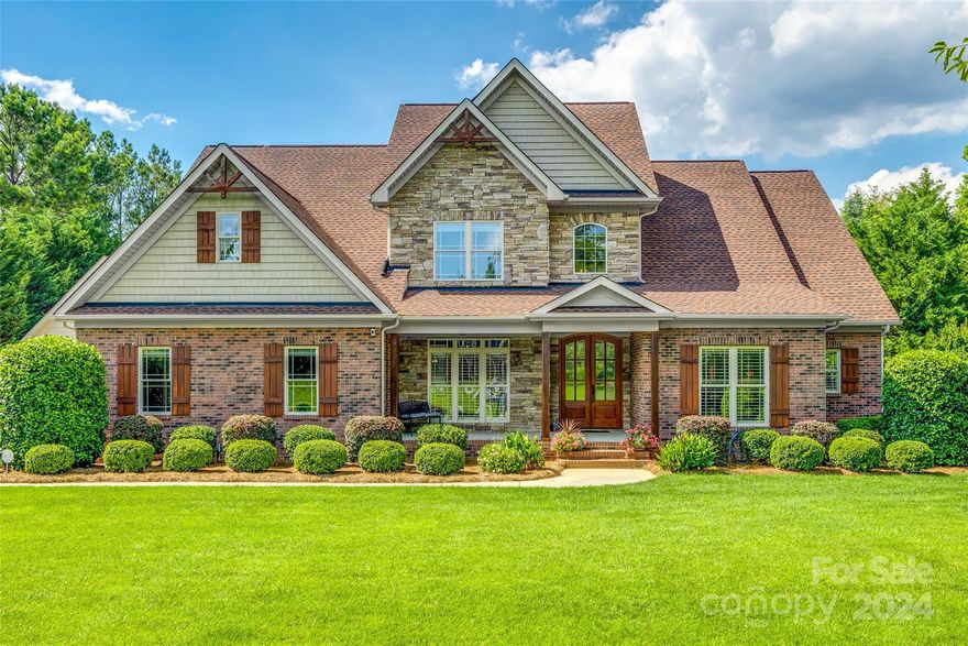 Perfectly nestled in peaceful Holland Springs this FULL BRICK home boasts extensive upgrades & a beautiful neutral color palette. Impressive 2-story foyer, gleaming hardwood floors, coffered ceiling, stunning moldings. 4-beds, each w/ en-suite bath, featuring the primary suite on the main floor, first-floor guest room/office, 3 remaining bedrooms on the upper level & additional spacious bonus room. Gorgeous kitchen w/warm toned cabinetry, center island, granite countertops, butler's pantry & breakfast area, leading out to your personal backyard oasis. Newer low-maintenance Trex deck overlooks the inground pool, extended patio, perfectly landscaped/exceptionally private lot; perfect for entertaining or enjoying a peaceful night at home. Other recent updates include new roof in 2022, water heater ('22), carpet ('21). This house has amazing storage with lg unfinished attic area, walk-in closets, huge detached garage workshop, w/ reinforced flooring above. Welcome to your dream home!