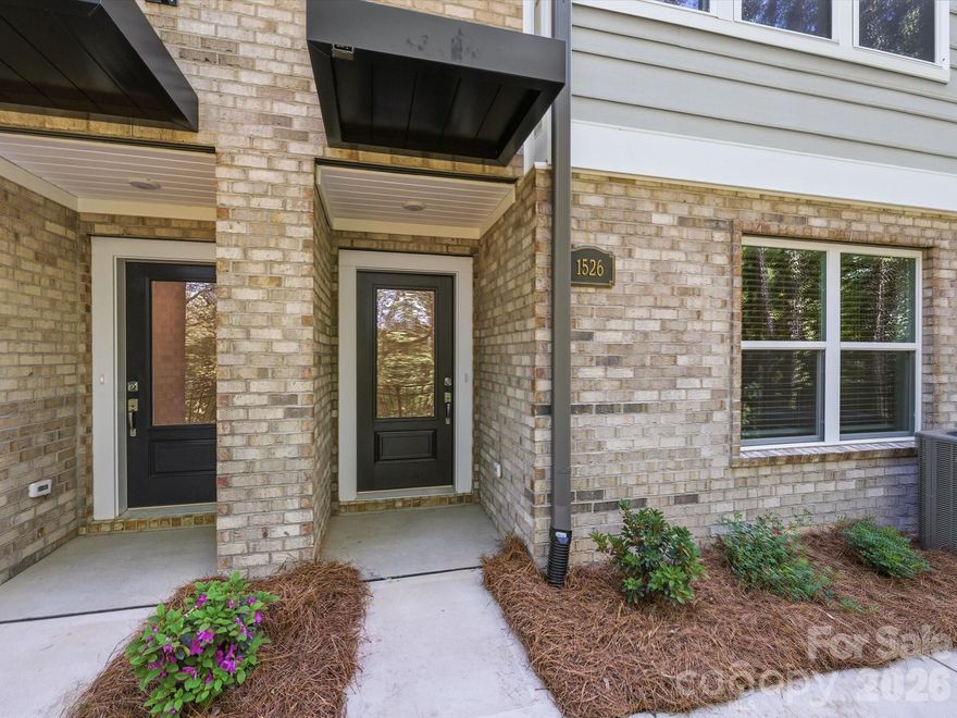 Discover this stunning 3-bed, 3-bath interior townhome, perfectly positioned on a prime tree-lined lot. Enjoy elevated living with a spacious balcony, 9-foot ceilings, and an expansive kitchen island ideal for entertaining. Designed for comfort and efficiency, this home features energy-saving construction, luxury vinyl plank flooring, and signature David Weekley oversized windows that fill every room with natural light. The kitchen is beautifully appointed with Frigidaire Gallery appliances, blending style and performance in every detail.