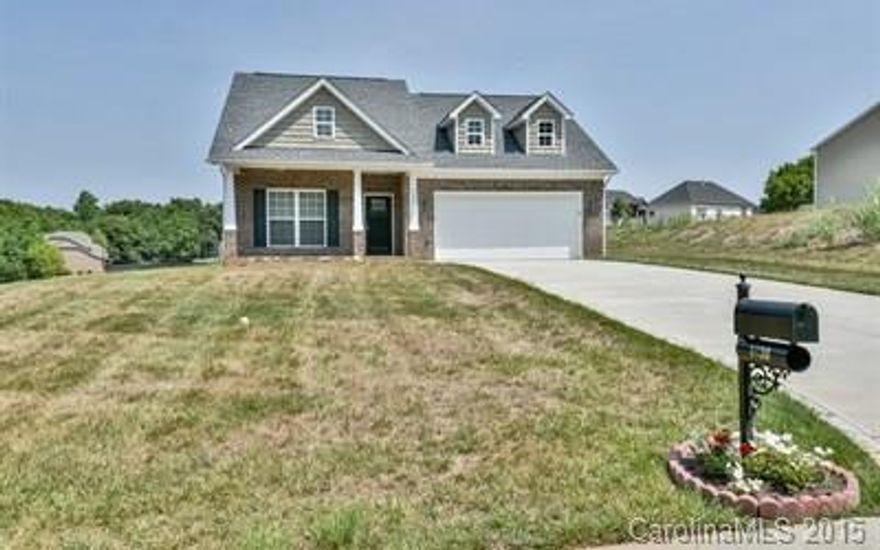 Almost new 3 bedroom, 2 bath Ranch home located on corner lot.  Beautiful hardwood floors in foyer, office, kitchen and family room.  Granite in kitchen and bathrooms, stainless steel appliances, gas range, utility sink in laundry room, arched doorways, screened-in porch, gas-grill line at patio and 2-car garage.