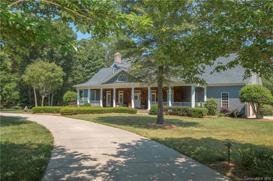 Gorgeous custom in Excellent location! Custom home boasts, true hardwoods, two fireplaces, Architectural detailing and ceilings that are true custom! Large gourmet kitchen with beautiful eat in area that overlooks expansive back yard, Generous bedrooms, large master bedroom with huge cedar lined closet tiled masterbath.  Outdoor living at it's finest with beautiful front porch with stone, a large back porch that leads to a beautiful stone patio. 26X30 Detached garage/workshop!