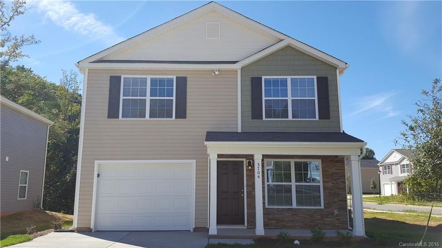 This brand new construction home has never been lived in, and is just waiting for you to come bring your special touch to it! This home boasts FOUR bedrooms, it's massive! From the front door, walk right into the spacious living room which boasts brand new, fresh carpeting in a neutral color which can perfectly coordinate with any living room decor!