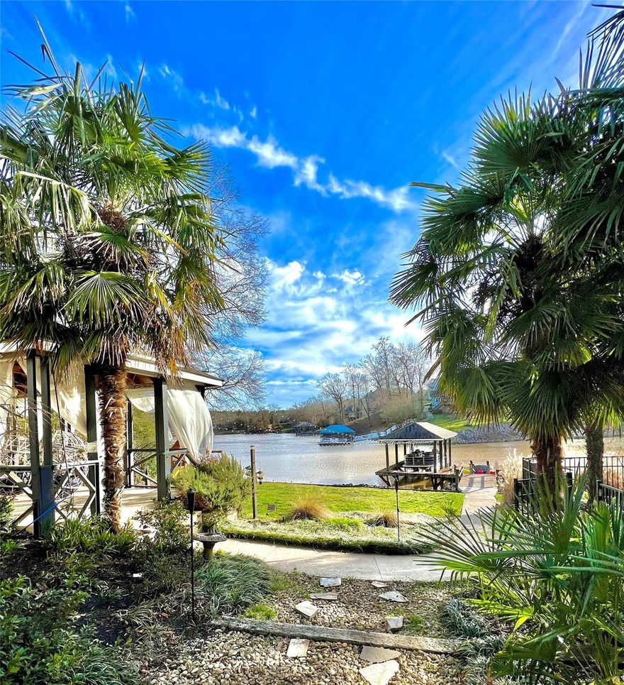 Custom resort-like lake home with NO HOA, a POOL, deep water covered dock w boat lift, rip rap protected waterfront, an outdoor living oasis including outdoor kitchen, pizza oven, large covered gazebo, & several porches and areas to relax or entertain on. This massive home has a unique split level floorplan boasting 5 BEDROOMS (on a 3 bed septic). Inside you are immediately impressed by the wall of windows showcasing the priceless lake view! The kitchen is open and updated. The huge primary bedroom suite is its own retreat with a fireplace, sitting area, & balcony. The spa like bathroom has a tile shower, glamourous claw foot tub, & two walk in custom closets. There is a large rec/flex/bonus room that can be utilized for any buyer's needs. The basement is a great 2nd living area or entertainer's dream with an oversized bedroom for multigenerational living/separate guest suite with a 2nd kitchen, 2nd bonus room, 2nd laundry, 1.5 baths, & theater room! Clover Schools! Low SC Taxes!