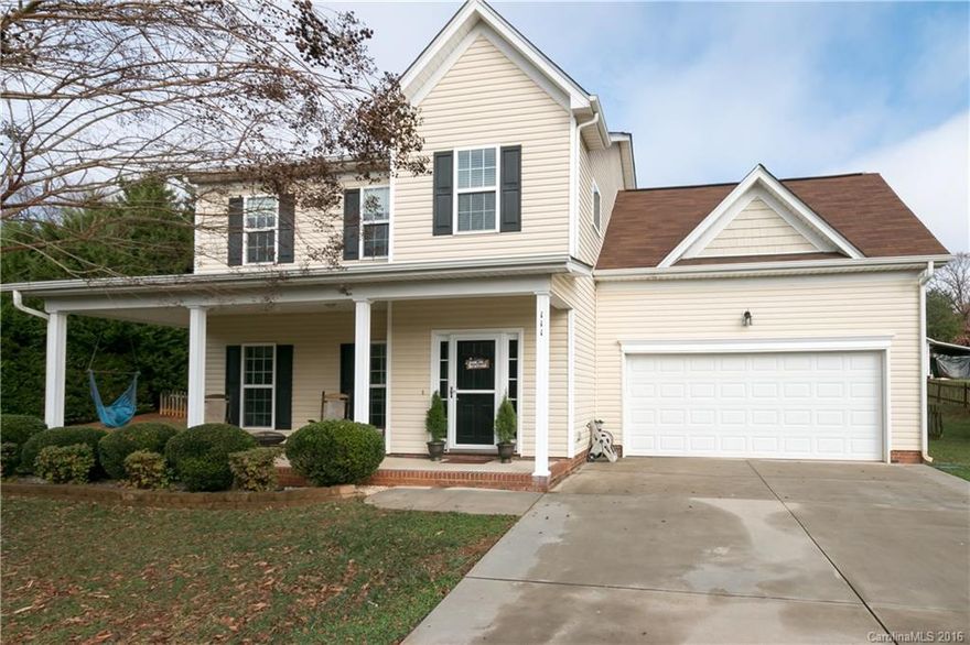Rocking chair front porch greets you into this move-in ready home w/crown molding thru-out main, surround sound & New hardwood & ceramic tile flooring! Granite kitch w/SS appls opens to GR w/FP & fan. Light-filled Brkfast room leads to back deck, overlooking a level, fenced yard.  Master Suite w/WIC & dual sink vanity. Guest BRs overlook backyd. Bonus Rm w/closets. Can't beat location near Langtree & Lowe's Corp w/easy access to Davidson & just 25 mins to Concord Mills! Iredell Co schools.