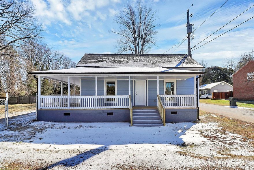 Like-new, fully remodeled home with extensive upgrades throughout - no detail overlooked. NO HOA!

This beautifully renovated property was taken down to the bones and rebuilt with quality, longevity, and modern living in mind.

Exterior improvements include a brand-new roof, new engineered wood siding, brand new HVAC unit (warranty uploaded), and a new wraparound porch, including all new decking and ceiling, offering excellent curb appeal and inviting outdoor space.

Inside, the renovation continues with all-new walls and ceilings throughout, new framing in the kitchen and adjacent bathroom, and new structural joists in the kitchen, bathroom, laundry room, and hallway. The entire home features new plywood subfloors and tile, new flooring throughout, and fresh interior and exterior paint.

The thoughtfully designed galley kitchen pairs modern finishes with an efficient layout, featuring all new white cabinetry, new quartz countertops, new sink, and new stainless steel appliances. Smartly configured to maximize functionality, this space offers a clean, contemporary look and effortless flow into the spacious breakfast space ready for a table - perfect for a low-maintenance lifestyle.

Both bathrooms are completely new, featuring new toilets, vanities, showers, and fixtures. Additional upgrades include all-new doors and baseboards, new light fixtures, ceiling fans, plus all-new windows throughout for abundant natural light.

Major system upgrades provide true peace of mind:
• Electrical system almost entirely rewired (invoice uploaded)
• Plumbing fully replaced starting at the main line
• All new water supply lines and drains
• New plumbing for master bath toilet, shower, and sink
• New plumbing for secondary bath tub, toilet, and sink
• New laundry supply and drain lines (invoice updated)

The property also offers a large, flat, fully fenced backyard, ideal for outdoor living, pets, play, or future enhancements.

Home is a short walk to downtown Kings Mountain and is 5 minutes from the new casino!

This is a rare opportunity to own a truly turnkey home where virtually everything is new. Perfect for buyers seeking modern comfort, quality craftsmanship, and minimal maintenance for years to come.