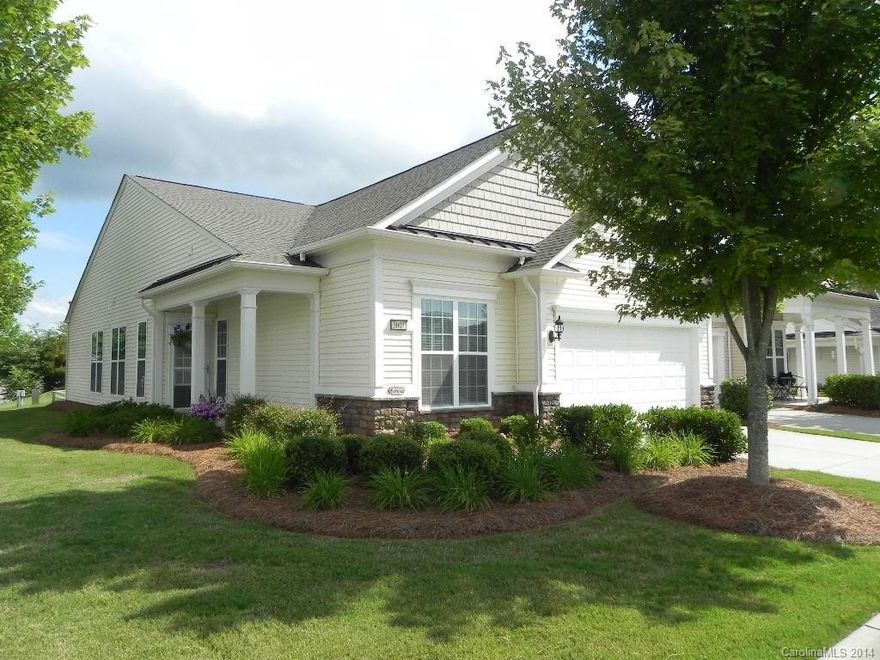 This cheerful Muirfield villa has 2BR/2BA, office & a screen porch. It features hardwood floors, ceramic tile & carpet in the bedrooms. The kitchen has Corian counters, tile backsplash, stainless appliances & an electric stove. This home is located in the front of the community, walking distance to shopping, amenity center, medical complex & golf club. Come check out the community & the active adult lifestyle of Sun City Carolina Lakes.