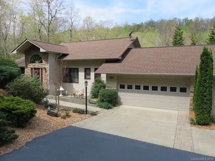 Finely finished town home in Qualla Village. Backs up to a stream. Near the swimming/fishing dock. Well built, sound proof. Wet bar lower level. Large deck upper level, patio LL.  Great entertaining space. Master bdrm w/ walk in closets. Vaulted ceilings in the Great Room. Amenities incl 4 lakes, parks, championship golf course, tennis facility, club house, hiking trails, wellness center, heated swimming pool, and more. First time buyer to Connestee Falls pays $8,000 UF