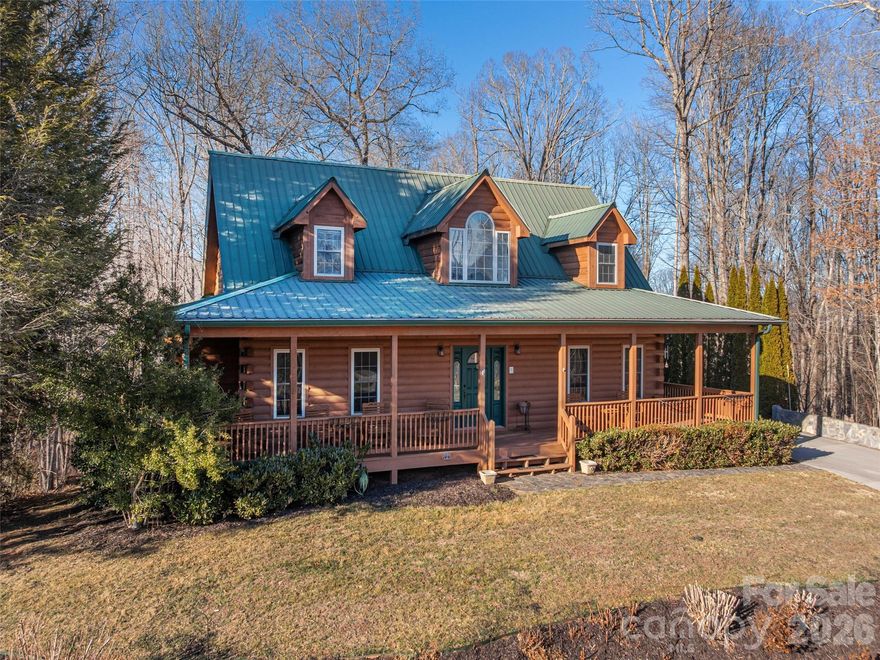 First time on the market, this one-owner custom home offers living at its finest in Hickory Hills at Lake Junaluska. Enjoy mountain views from the front porch and a lovingly maintained 3BR/3.5BA layout designed for comfort and easy living. The open great room welcomes natural light and warmth from the fireplace, with adjoining formal dining, breakfast nook, and a well-appointed kitchen perfect for entertaining. A spacious main level, primary suite with dual walk-in closets, plus two guest bedrooms each with a private bath on the upper level. A study with French doors opens to the deck, while the lower level boasts a large family room with corner fireplace, bonus space, and full bath—ideal for gatherings or hobbies. The oversized concrete driveway provides ample parking. Convenient to shopping, dining, and recreation. Residents enjoy cooler summers, lakeside strolls, and Lake Junaluska’s vibrant community.