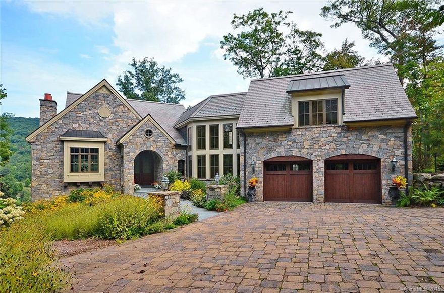 Enjoy the refreshing breeze and long-range mountain views of the surrounding Blue Ridge Mountains, Blue Ridge Parkway overlook, and golf course from this gorgeous home. Spacious, open living area and master suite. Guest suite with wet bar on second level. Adorable bunk room, family room and bedroom suite on the terrace level. Wide stairways, ironwork, outdoor lighting and many other thoughtful upgrades throughout. Cliffs membership available.