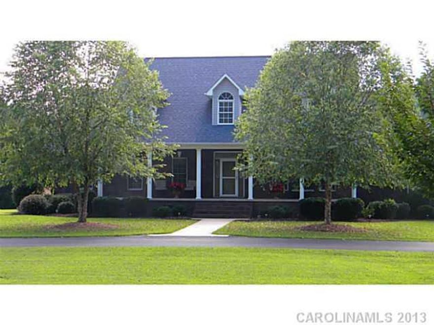 Stunning ranch with beautiful hardwood floors, gorgeous molding and trey ceilings, neutral tones throughout,  fantastic kitchen with  4' x 5' solid surface island, warming drawer,  custom cabinets, split plan with large master suite and master bath, whirlpool tub/separate shower,  love the outdoor living, screened porch and superb large covered  porch front and back overlooking  gorgeous  acres