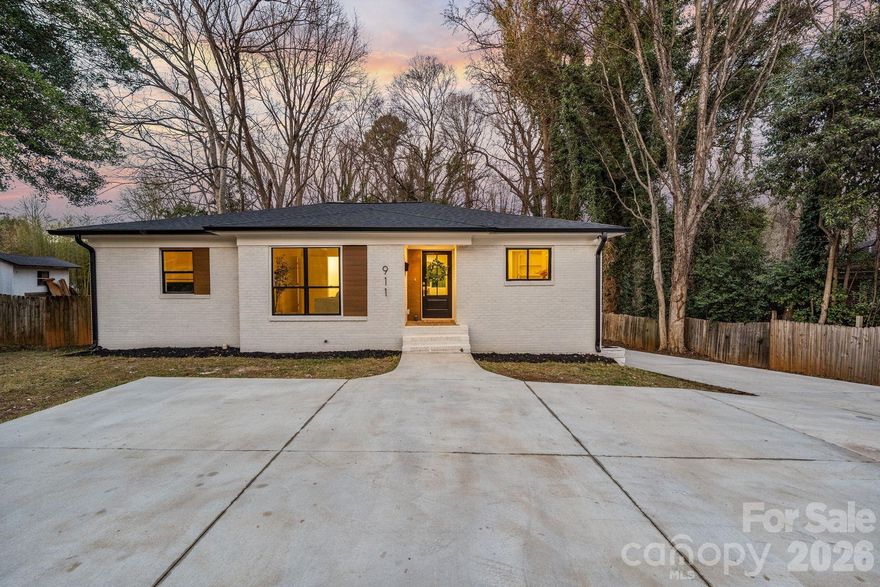 Rare opportunity in prime location! This home delivers the space, style, and location that are becoming increasingly rare near Madison Park. Offering nearly **3,000 square feet of living space** on an expansive **almost half-acre lot**, this home combines elevated design with exceptional functionality.

The main level was built for entertaining, featuring stunning architectural archways, open gathering spaces, and seamless flow throughout. The designer kitchen opens effortlessly into the living and dining areas, creating an inviting atmosphere for both everyday living and hosting. You will love the waterfall quartz kitchen island, custom cabinetry, and accommodating pantry. 

The oversized primary suite is a true retreat with a spa-inspired en-suite bath straight out of a magazine. The custom arched glass doors, stand alone tub, and elegant tile will leave you speechless. With 4 bedrooms and 3 full baths, the layout also includes a private guest suite and secondary living space downstairs—ideal for multi-generational living, guests, or a media room.

Outside, the large driveway and rare two-car garage provide convenience and storage rarely found in this area. Located just moments from Madison Park, walking distance to Park Road Shopping Center and close proximity to South Park. You will notice the luxury redevelopment and renovated homes in the area. 

A rare opportunity to own a design-forward home with this level of square footage, lot size, and garage capacity in one of Charlotte’s most desirable locations!