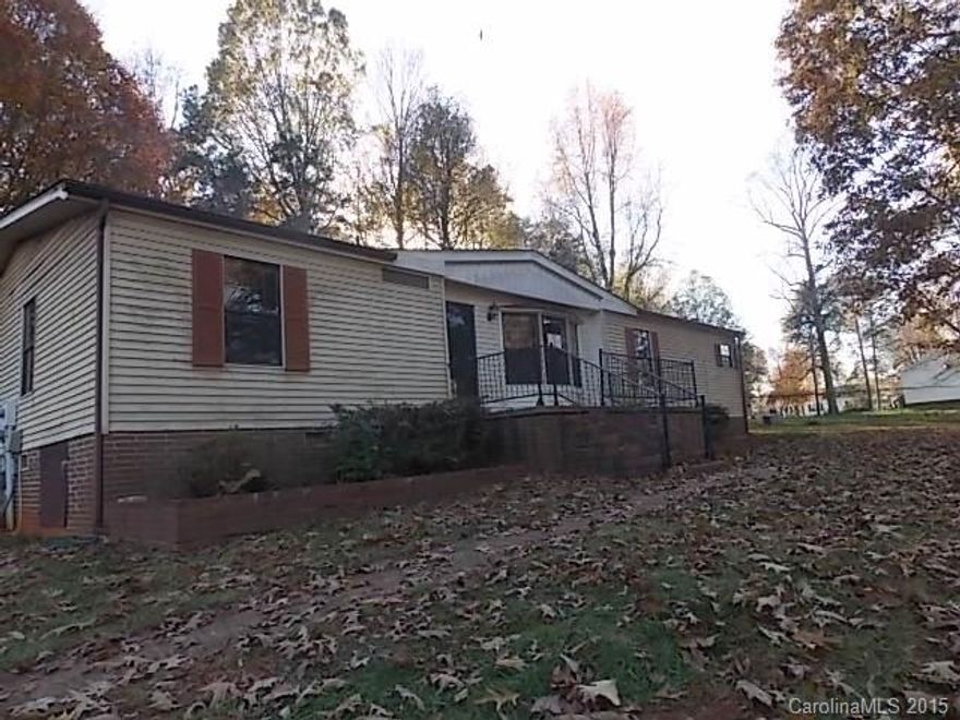 If your Ready to Move to the Country-Rowan County--Here is your Home!  Detached Double Garage-Mechanic Pit and Workshop area with Carport, Front and Rear Deck, Fireplace in Living Room, Chicken Coup, and Chain Link Fencing.  Quick access to I-85, Tuckertown Dam and High Rock Lake.