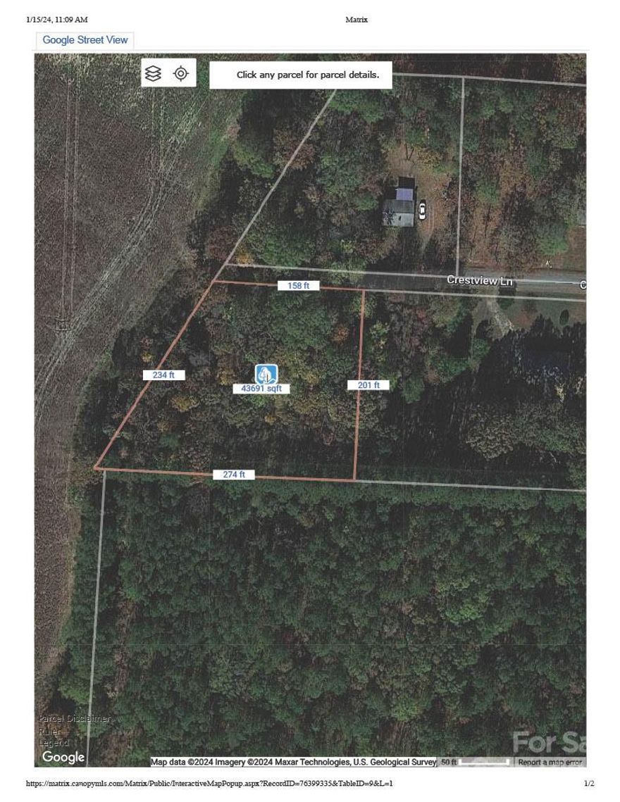 partially cleared 1 acre lot.  City water is available for a tap fee. Close to shopping and restaurants, yet private on a dead end streeet.