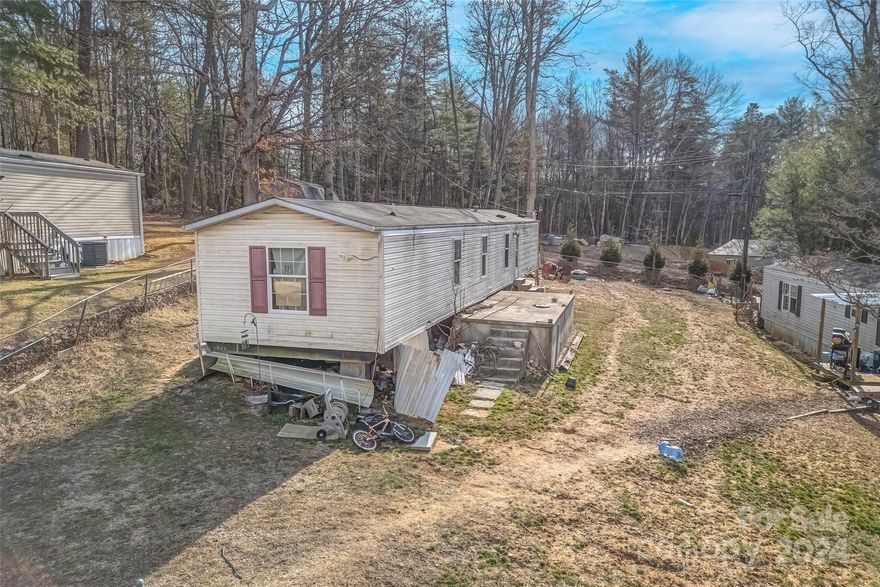 Introducing a unique real estate opportunity in Fairview – a single parcel with two mobile homes, both with current tenancy over 12 months. Ideally situated directly across from the Local Joint restaurant, this property offers not only a comfortable living space but also a prime location.

As you approach the property, you'll find a private drive leading to the two mobile homes on the right. 

Whether you are an investor seeking a lucrative opportunity, a landlord looking to expand your portfolio, this property is poised to fulfill your objectives.

Don't miss out on owning a piece of Fairview real estate that combines potential rental income, and a prime location. Contact us now to schedule a viewing and explore the possibilities that await you. Owner financing will be considered. In order to be mindful and respectful to the tenants, please, no drive bys.