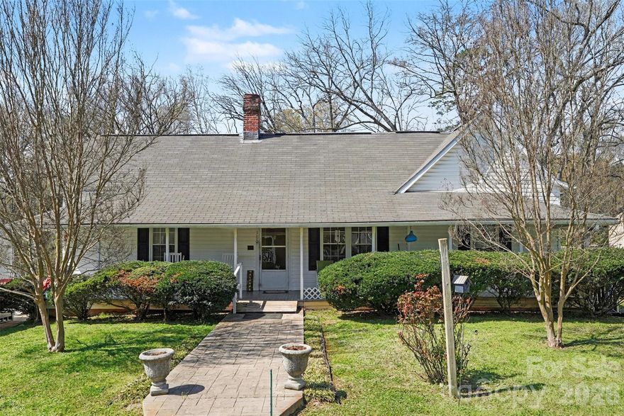 Charming Century-Old Gem in the Heart of Waxhaw. Step back in time with this 1920s single-story home located just blocks from the vibrant Historic Waxhaw district. Spanning over 1,688 square feet, this 2-bedroom, 2-bathroom residence offers the perfect blend of small-town nostalgia and modern convenience. Situated on a generous 0.35-acre lot, the property provides ample outdoor space for gardening or entertaining, all within walking distance of local shops, dining, and the iconic overhead pedestrian bridge. Whether you’re looking for a cozy primary residence or a unique restoration project, this home captures the classic North Carolina small-town spirit.  This home is part of the Historic Registry of Waxhaw.