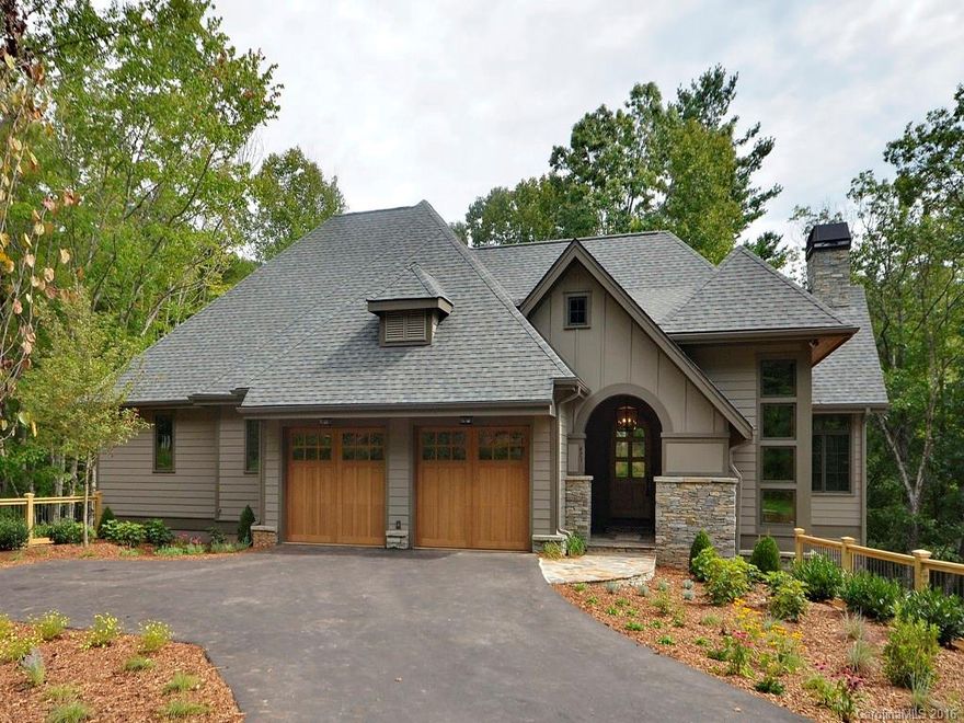 Stunning brand new custom home built by Timberline Homes on a large wooded homesite in established gated mountain community. Open, spacious main level and finished lower level with treehouse feel & lots of glass to bring in the outdoors. High end finishes & architecturally designed for the site. Convenient location to DT Asheville, the Airport, Hendersonville and Fletcher; under 5 miles to S Asheville shops & conveniences.