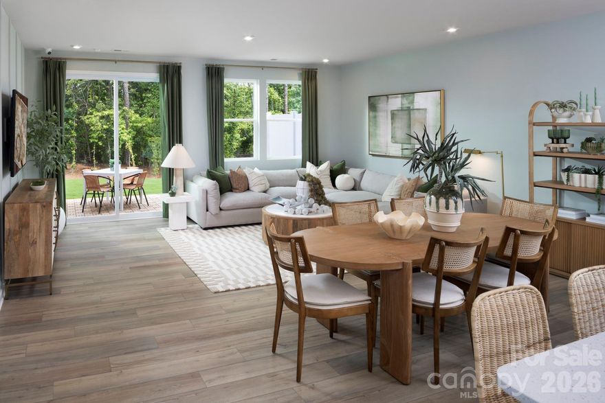 Welcome to the popular Aurora floorplan in the sought-after Stonesummit at Reedy Creek community. This well-designed townhome offers an open, functional layout with spacious living areas, abundant natural light, and modern finishes throughout. The seamless flow of the main living spaces is ideal for everyday living and entertaining. The upper level includes a private primary suite along with additional secondary bedrooms and bathrooms. Contemporary finishes and ample natural light enhance the home’s functional design. Conveniently located with easy access to Uptown Charlotte, shopping and dining in University City, live entertainment at PNC Music Pavilion, and outdoor recreation at Reedy Creek Nature Preserve and Park.