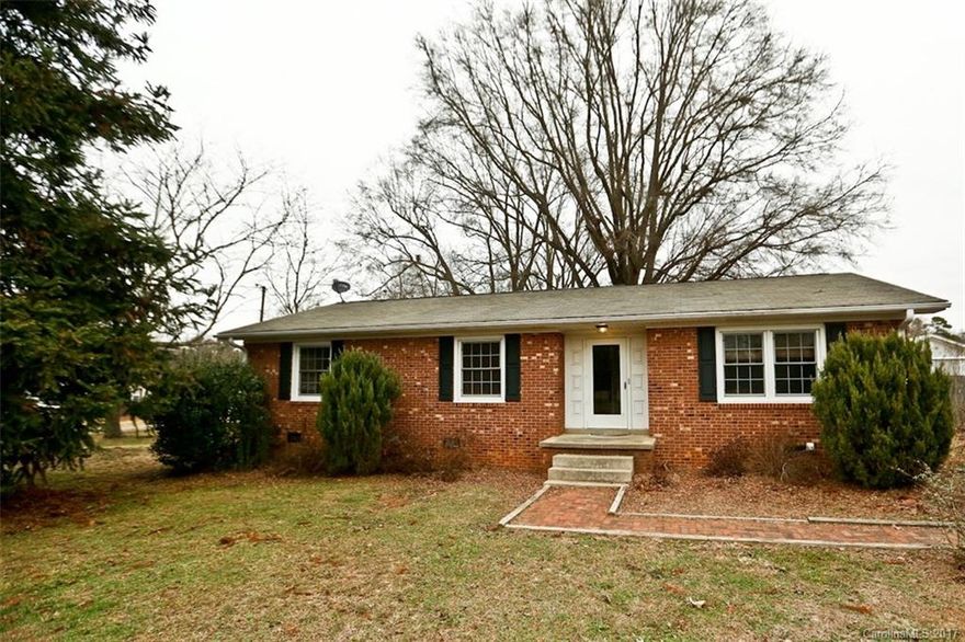 Fantastic 3BR/1.5BA brick ranch on 1 acre.   Conveniently located on Hwy 73 within minutes of Afton Ridge and I-85. Huge metal building with around 978 sqft is a mechanic's dream.  Second concrete block structure is 700sqft with fireplace, upstairs loft, and bath room. Fantastic back porch, and covered deck for enjoyment.  Home being sold at this great price in AS-IS condition.