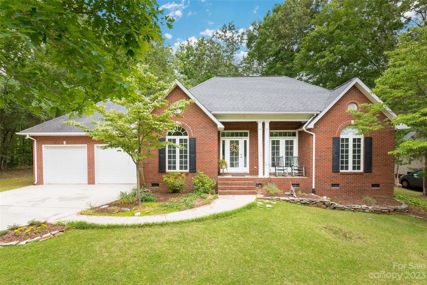 Well maintained, move in ready three bedroom, two bathroom home awaits you.  Spacious living area inside and out yet still the feel of a subdivision neighborhood without the homeowners association and dues.  Kitchen has plenty of counter-space, dishwasher and new over-the-range microwave.  Built-in dining room cabinet.  Vaulted ceilings, large laundry room, split bedroom floor plan.  All brick with oversized two car garage.  All exterior doors have been recently painted.  Front porch, back deck and nice size storage building all on a  beautiful lot that’s almost an acre.  Golf course is a little over a mile away; close proximity to Downtown, restaurants, shopping and Greenway.