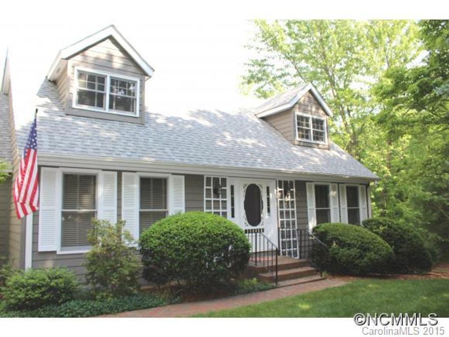 Award winning kitchen! Equipped with appliances including wine fridge and warming drawer. Great room with fireplace and built-ins. Formal dining and living rooms. Hickory floors. Full unfinished walk out basement to patio. Screen porch and deck overlook lovely tree lined yard.Large cedar closet. Carpet allowance of $2500 at closing with an acceptable offer.