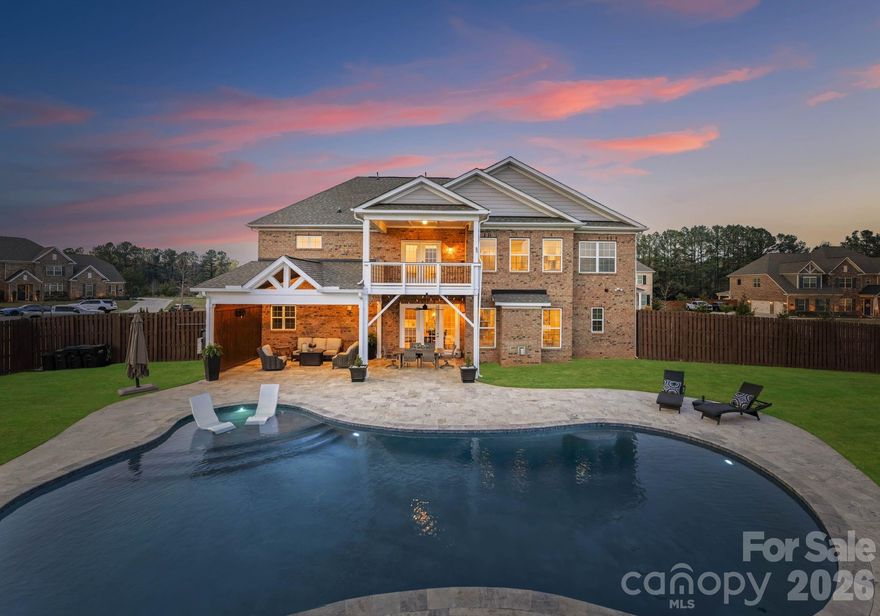 Stop searching-this is the one! From the moment you step inside, this stunning executive home feels just right. Located in the highly sought-after Weddington area, it offers access to top-rated schools, close proximity to shopping and dining, and quick access to interstates for an easier commute. Situated on an expansive lot, the backyard is a true retreat featuring a resort style inground pool with travertine decking and an attached covered patio- a perfect oasis ideal for relaxing or entertaining. The main level showcases a spacious, open concept-kitchen and great room. The kitchen is appointed with stainless steel appliances, an oversized island, and a convenient butler's pantry that connects to the formal dining and living spaces. Upstairs the primary suite offers a peaceful escape, featuring a sitting area, with access to an outside covered balcony- perfect for enjoying your morning coffee or unwinding at the end of your day. Three generously sized secondary bedrooms, each offer access to full baths, providing comfort and privacy for family and guests. A dedicated office/flex space adds versatility, while the spacious bonus room is ideal for a playroom, media room or additional living area. This home has it all, a rare opportunity to enjoy luxury living in one of Union County's most desirable communities.