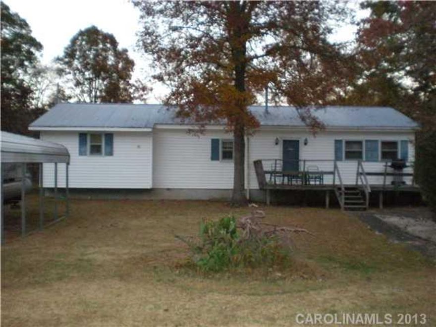 Great home in nice neighborhood for full-time residence or a weekend get-a-way.  Enjoy the benefits of Badin Lake, with beach access and boat ramp in neighborhood..  Nice flat yard.  Great outbuilding for storage.  Tin Roof.  Well.