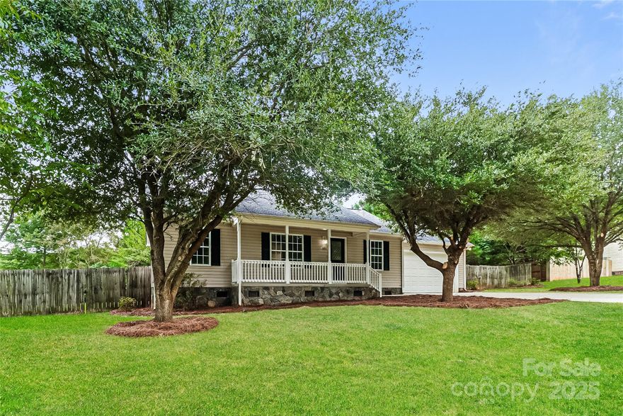 This beautifully updated 3-bedroom, 2-bath single-family home features a split floorplan and modern upgrades throughout, including new LVP flooring, fresh interior paint, new carpet, and stylish light fixtures. The kitchen shines with painted cabinets, new stainless range, vent hood, dishwasher, sink, and quartz counters. Outside, enjoy a replaced deck perfect for relaxing or entertaining.
