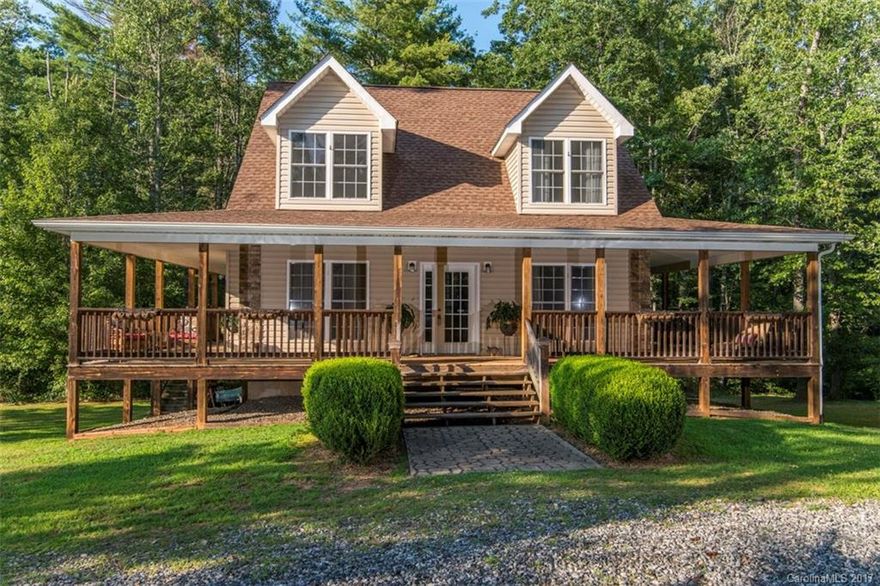 Country roads will take you home to the place you belong...Which is Mars Hill NC! Located just a short distance from bustling Avl and adorable Weaverville, the town of Mars Hill boasts a renowned college, restaurants, coffee shops, and more. This well loved home offers so much, from the master suite on the main level, The beautiful way the light pours into the home, lots of deck space looking into nature..you get the idea. You must see this one today!