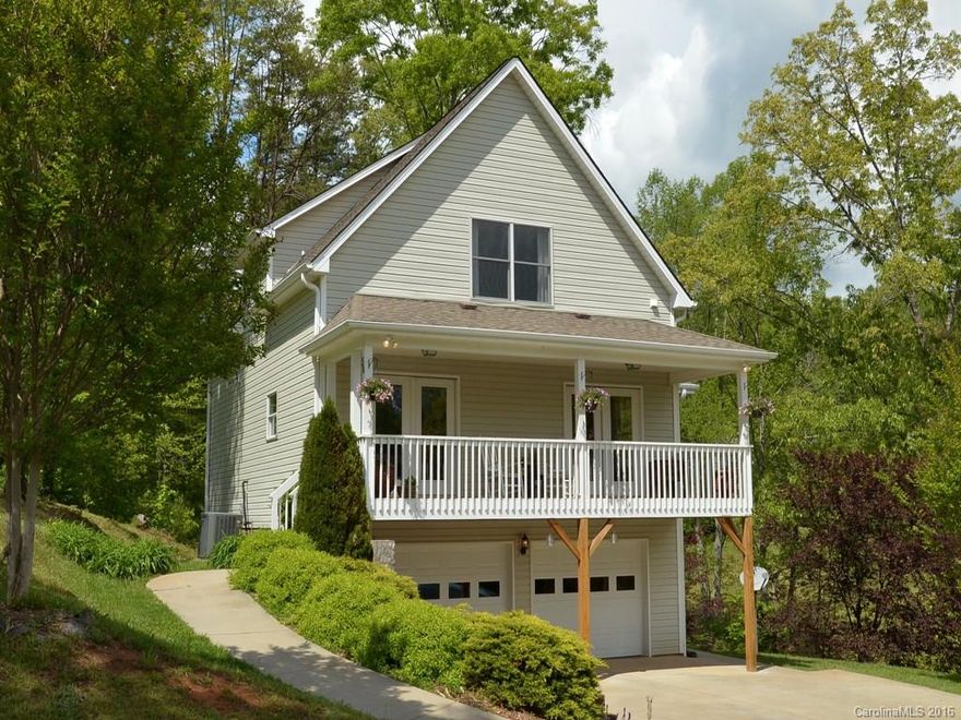 Clean as a whistle! Charming 3 bedroom 2 1/2 bathroom,Open floor plan - bright open kitchen, living and dining with gas log fireplace. Beautiful wood floors.  Den/Office space in finished basement area. Spacious 2 car garage. On a great lot!