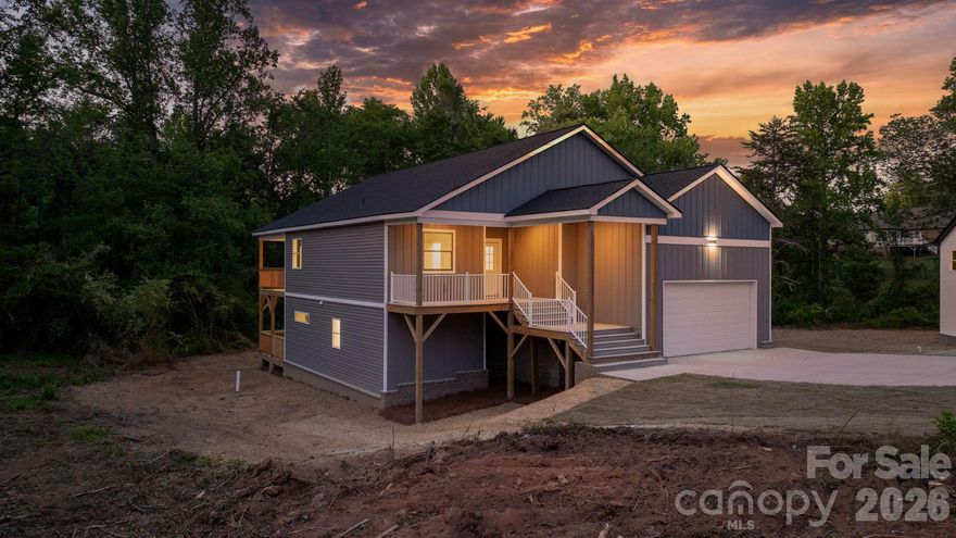 Welcome to this beautifully crafted 4-bedroom, 3-bath home built by Catana Homes, offering 2,128 square feet on a half-acre lot tucked into a cup-de-sac in the desirable Wittenburg Springs community near lake Hickory! Just 5 minutes from the Hickory city limits and 15 minutes to downtown Hickory, this location offers the quiet of a slightly-outside-the-city setting with everyday conveniences close at hand and no city taxes.
Inside, modern finishes and quartz countertops set the tone throughout an easy-to-live-in floor plan. Enjoy seamless indoor-outdoor living with a back deck off the main level,  perfect for morning coffee or evening gatherings. The walk-out basement is a true standout, featuring a full bedroom with closet, a full bathroom, and a back patio that opens directly to the yard. Additional unfinished space is ready to be customized into a media room, home gym, second living area, or in-law suite.
A 2-car garage, city water and sewer, and a generous backyard with plenty of room to fence in for your furry companions round out the everyday livability. Outdoor enthusiasts will love being less than 10 minutes from the Wittenburg Springs Boating Access on Lake Hickory.
4 bedroom, 3 bathroom Offered under $500,000 is rare! Private showings available next week reach out today to secure your appointment.