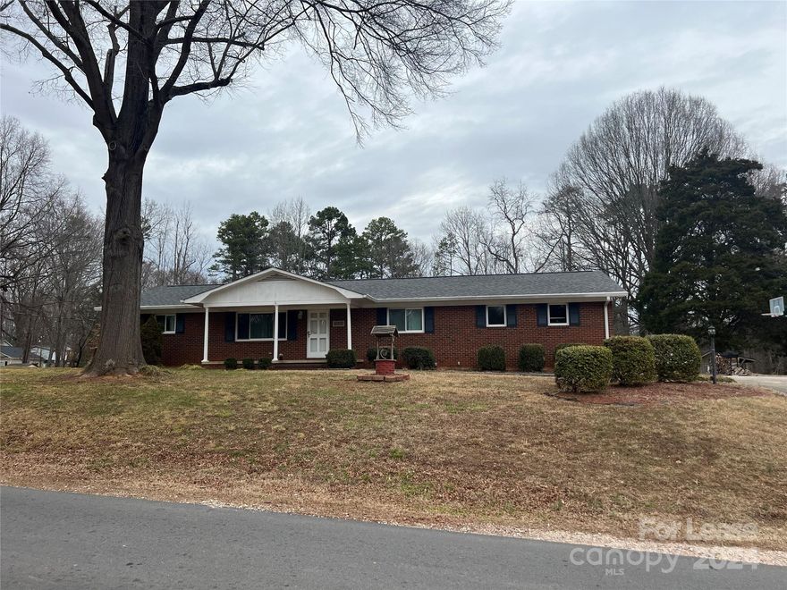 Rare Brick,  Ranch Style home with Basement... close to popular downtown Kannapolis. Large lot sitting on 1.12 acres with a fenced backyard. Wonderful 3 bedroom, 2 bath room home with recent updates to the bathrooms as well as the kitchen. Lots of storage in the full basement. 2 Car attached garage. Dogs allowed!