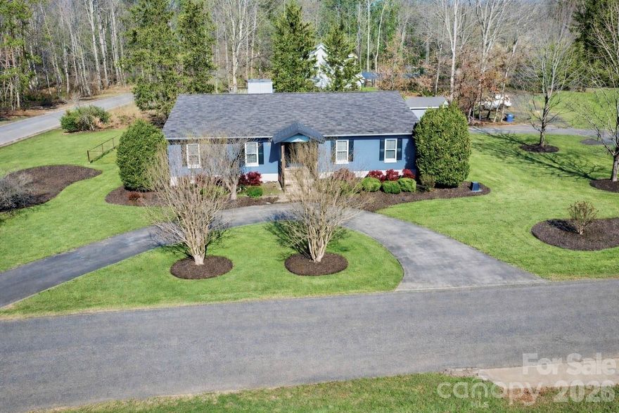 Luxury golf-course living awaits at this custom renovated residence in the pristine Brushy Mountain Golf Course community. Perfectly positioned across the street from the putting green, this 3-bedroom, 2-bath home offers an exceptional blend of elegance, comfort, and refined outdoor living. Enjoy serene mornings on the welcoming front porch and breathtaking sunsets from the expansive back deck.

Step inside to experience a home that has been completely transformed with deluxe upgrades throughout. The main level showcases a soaring vaulted ceiling in the living room, custom-built cabinetry, and a beautifully appointed gas fireplace, creating a warm yet sophisticated living environment. The kitchen and laundry areas have been reimagined with premium finishes, elevated design choices, and thoughtful improvements that deliver both style and unparalleled functionality.

The partially finished, fully heated and cooled basement extends your living space with endless possibilitie, and  ideal setting for a luxury media lounge, home fitness studio, office, or recreation suite.

Additional features include an oversized, 2-car garage and meticulous renovations from top to bottom, ensuring a turn-key, move-in-ready experience.

Whether you're a dedicated golfer or simply appreciate a serene, upscale lifestyle, this home offers an enviable combination of privacy, comfort, and golf-course prestige. Properties along Brushy Mountain Golf Course are rarely available. Don’t miss the opportunity to claim this exceptional home as your own.