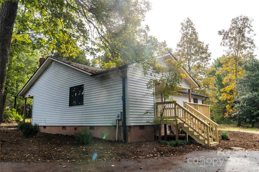 Discover a beautifully renewed, move-in-ready home that blends modern comfort with timeless charm—perfect for buyers seeking an updated property close to everyday conveniences and the vibrant Downtown area. With a long list of updates that include a new roof, new gutters, new HVAC, new flooring, new appliances, new bathrooms, a new deck, and a refreshed fireplace, this home provides an ideal blend of modern finishes, classic comfort, and low-maintenance living.

As you step inside, you’re greeted by a bright and open layout designed to feel both spacious and inviting. The living room centers around a newly updated fireplace that instantly creates a warm focal point. Whether you're unwinding after a long day or hosting guests, this room sets the tone for relaxed and comfortable living. The new flooring flows seamlessly throughout the home, enhancing the cohesive feel and giving every space a fresh, contemporary touch.

The fully updated kitchen features brand-new appliances and a clean, modern aesthetic that will appeal to anyone who enjoys cooking, entertaining, or simply having a beautiful and functional space to start the day. Thoughtfully selected finishes complement the home’s overall design, while ample cabinetry and counter space make meal prep easy. From here, you can access the newly constructed deck—an excellent spot for grilling, outdoor dining, relaxing, or enjoying the peaceful surroundings of the property.

The three well-designed bedrooms offer flexibility for various lifestyles. Whether you need a home office, a creative studio, or a quiet retreat, each room offers comfort and versatility. Both bathrooms have been fully renovated with up-to-date features, creating spa-like spaces with modern fixtures and finishes. Having all major systems and cosmetic details already updated ensures that buyers can simply settle in and enjoy the home immediately.

Outside provides privacy and room to breathe—ideal for gardening, outdoor activities, or simply enjoying nature. The detached two-car garage adds excellent value, offering covered parking, storage, workspace for tools and hobbies, or room for recreational equipment. This additional structure enhances the functionality of the property in a way many homes in this price point do not offer.

Beyond the home itself, the location is another highlight. With quick access to local amenities, shops, restaurants, parks, and Downtown destinations, this property offers convenience without compromising the quiet comfort of residential living. Whether you commute, enjoy weekend outings, or simply like having essentials close by, this address makes daily life more efficient and enjoyable.

With its extensive renovations, thoughtful design, generous lot, and extremely convenient location, this home offers a rare opportunity to enjoy the charm of an established property with the peace of mind that comes from modern upgrades. If you’re seeking a move-in-ready home with style, convenience, and space to enjoy, this property is ready to welcome its next owner.