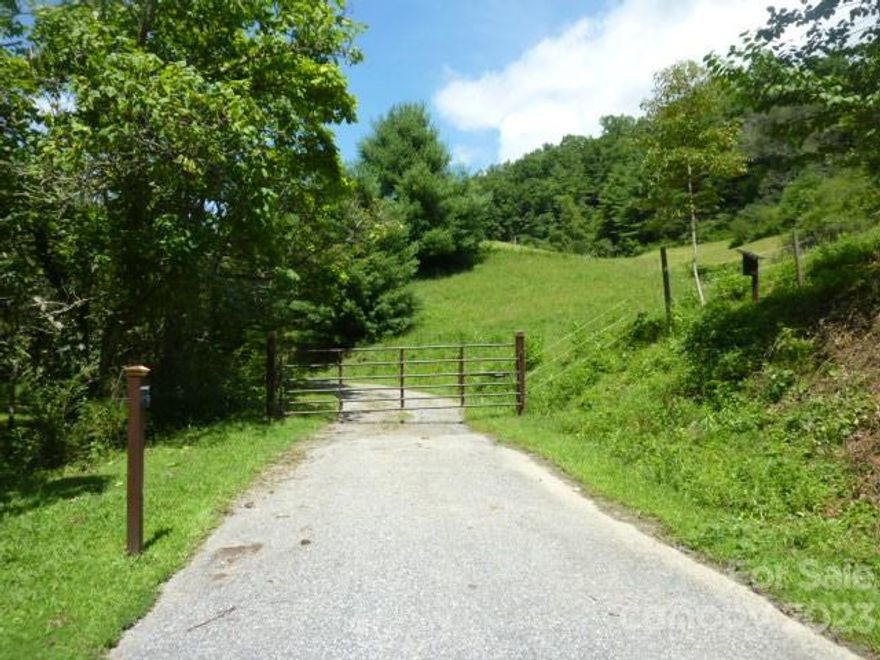 This is an incredible property with long range views, pasture, a spring and wooded areas. There are trails and a tobacco barn that has been converted and repurposed into a sweet and very efficient  barn for 3-4 horses with spring water piped into the barn. This acreage will be cut out of a larger tract with no restrictions other than only stick built or off frame mods are allowed. The drive is already into the beginning of the  property then there is a dirt road that leads to the top of the prop. where there are gorgeous views. That dirt road could be easily widened  and would make a wonderful permanent driveway.  Electric is close by on the property. Just 15 mins to Hot Springs and 55 mins to Asheville or Johnson City. There is an very active community center in this area of Madison County if you want to be involved socially.  We also have a General Store that is 4 miles down the road and folks like to hang out there and see each other like in the ole days of country stores past....