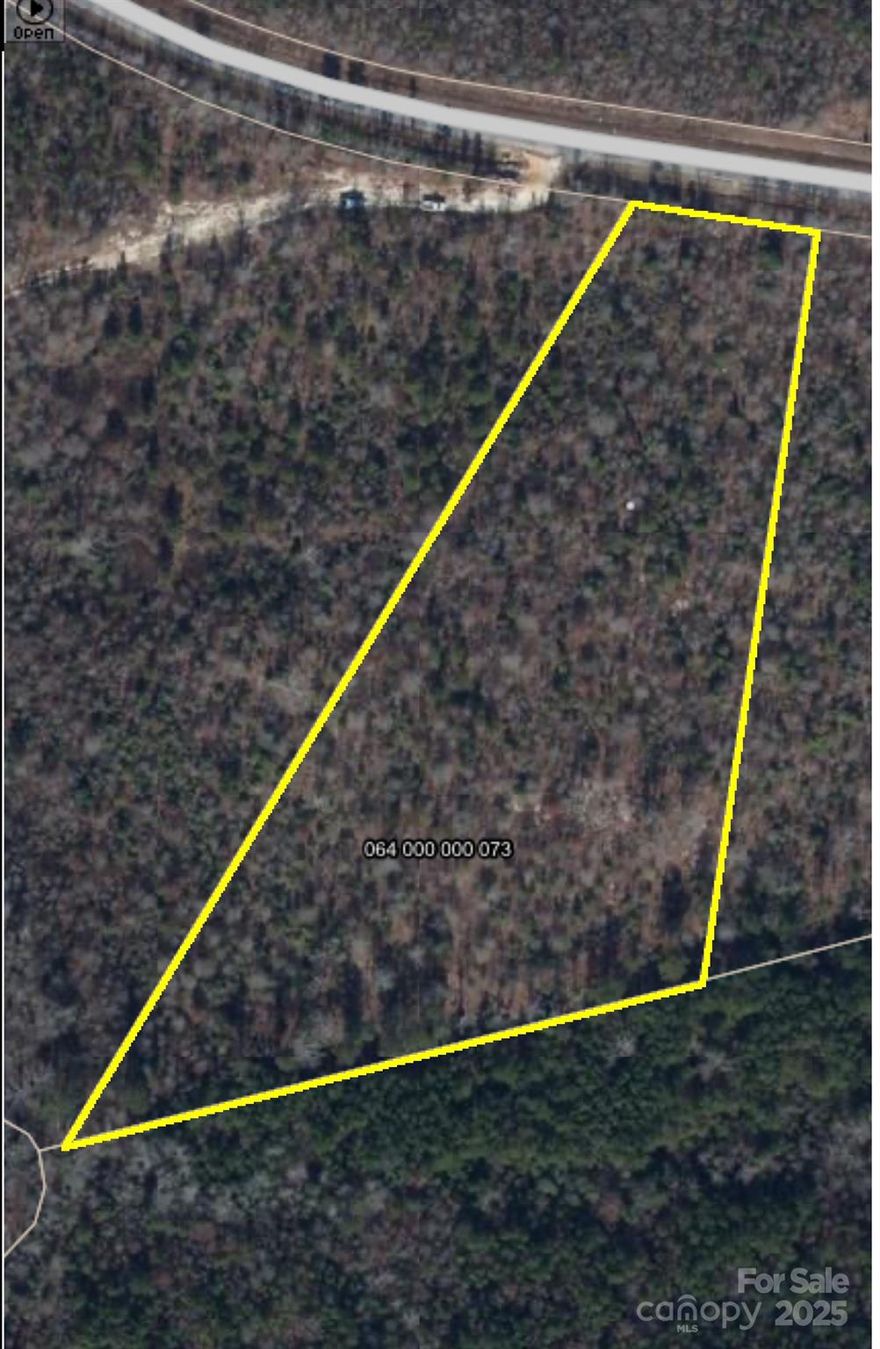 If you are looking for an established rural location for your dream home, this one may be for you!  It features paved road frontage and lots of space on the 4.61 acre parcel for your home and room to roam.