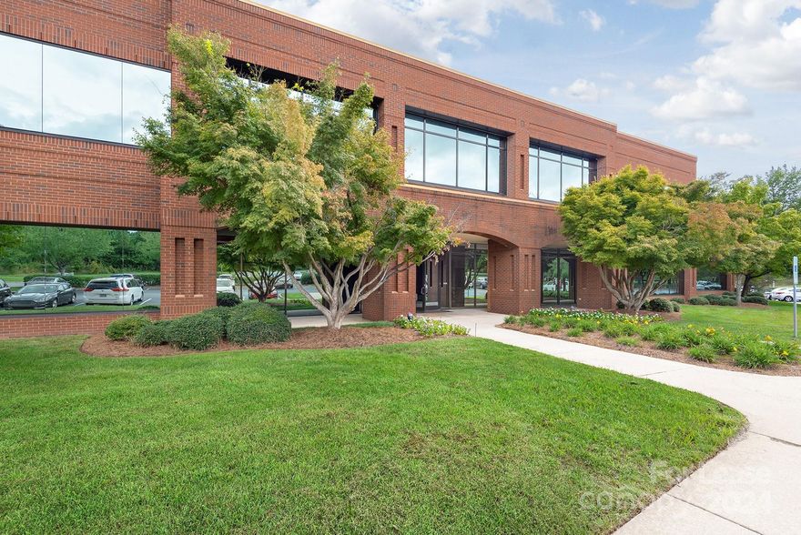 1200 Ridgefield Boulevard is a two-story glass and brick office building offering beautiful views and located in upscale, 100-acre Ridgefield Business Center in Asheville, NC. Well-maintained interiors and sophisticated finishes, quality common area amenities, quality building services, ample parking, and on-site management add to the excellent environment for many business types in a variety of office spaces. 
SUITE 261
1,107 SF. Part of the upstairs Executive Office Suites on the second floor. Reception area, conference room, 2 private offices, plus access to common area conference room and breakroom.