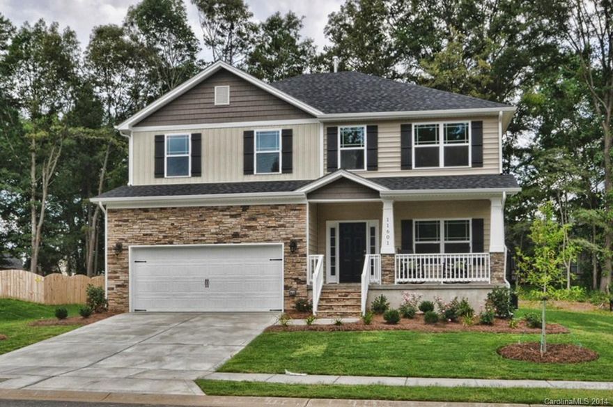 Hardwood Floors throughout main level. All bedrooms have oversized closets. Luxury Bath in Master.  Fireplace with gas logs. Open plan with separate living room.  Upgraded kitchen with island, granite, tile backsplash, and stainless steel appliances. Deck overlooking back yard.
